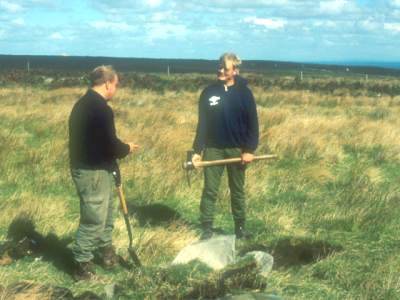 Excavating a test-pit in 1990 © A J Schofield